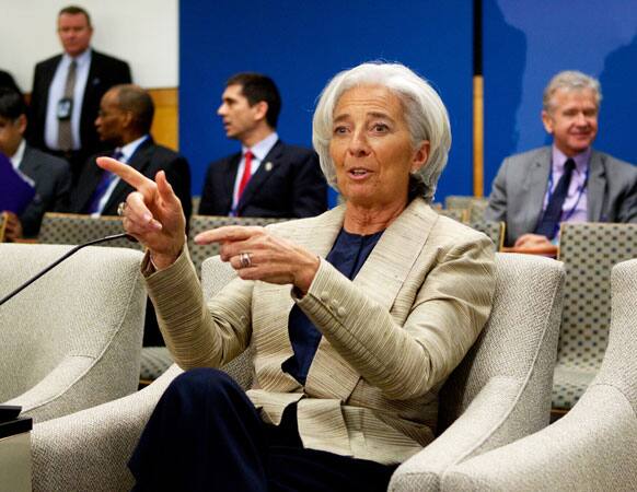 International Monetary Fund (IMF) Managing Director Christine Lagarde waits for the start the International Monetary and Financial Committee meeting during the World Bank IMF Spring Meetings in Washington.
