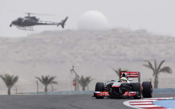 McLaren Mercedes driver Sergio Perez of Mexico rounds a corner during the third free practice ahead the Bahrain Formula One Grand Prix.