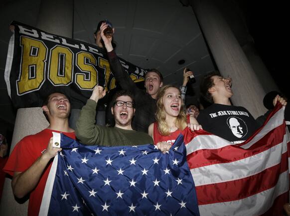A crowd gathers at Boston Common after the final suspect in the Boston Marathon bombing was arrested, in Boston.