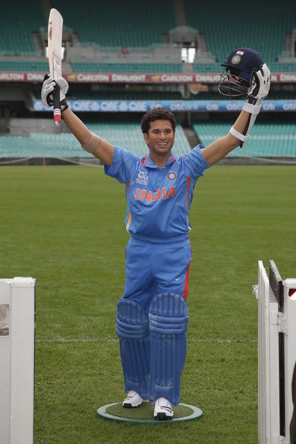 A wax statue of Indian cricketer Sachin Tendulkar stands on the field at the SCG in Sydney, Australia.