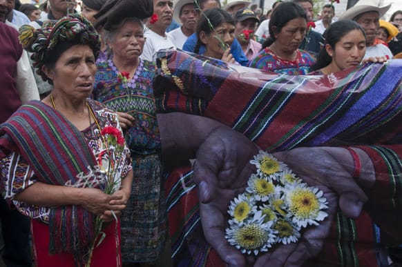 Ixil indigenous women stand outside of the court one day after a judge ordered the suspension of the genocide trial against Guatemala`s former dictator General Efrain Rios Montt and General Jose Mauricio Rodriguez Sanchez in Guatemala City.