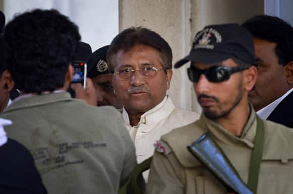Pakistan`s former president and military ruler Pervez Musharraf leaves after appearing in court in Rawalpindi.