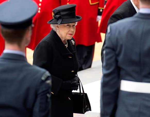 Britain`s Queen Elizabeth II arrives for the funeral of former British Prime Minister Margaret Thatcher, outside St. Paul`s Cathedral, London.