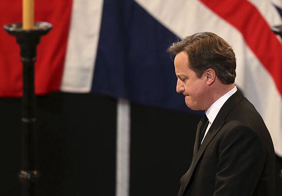Britain`s Prime Minister David Cameron gives a reading during the ceremonial funeral of former British Prime Minister Margaret Thatcher at St Paul`s Cathedral in London.