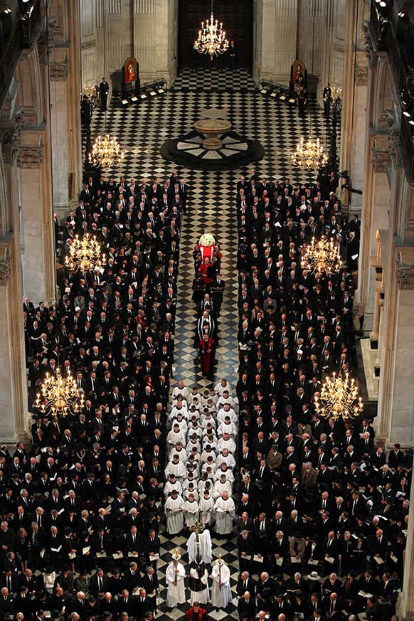 An overhead view shows the coffin containing the body of former British Prime Minister Margaret Thatcher carried down the aisle at St Paul`s Cathedral in London.