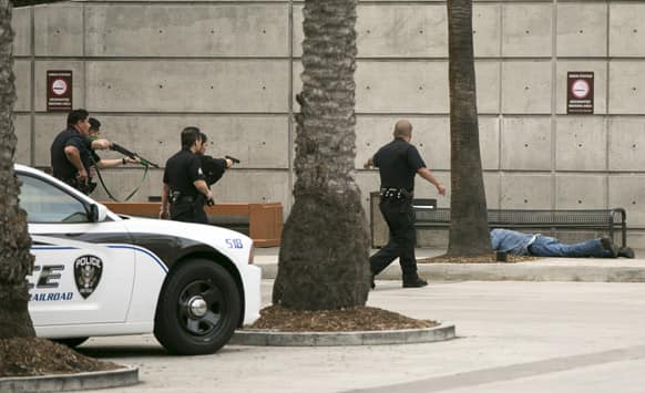 Los Angeles Amtrak Police officers arrest a man outside Union Station in Los Angeles. The city increased security following bomb explosions in Boston.