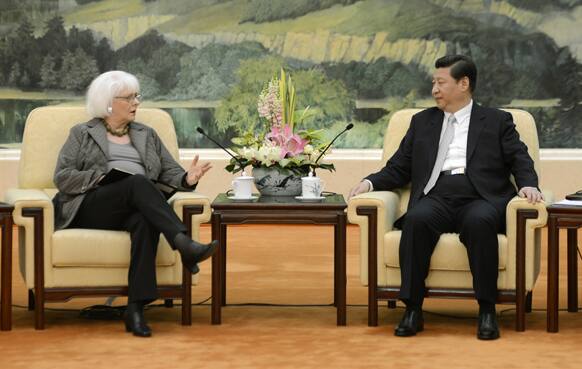 Iceland`s Prime Minister Johanna Sigurdardottir, left, talks with Chinese President Xi Jinping during a meeting at the Great Hall of the People in Beijing.