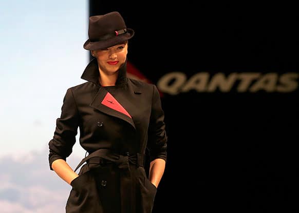 Model Miranda Kerr struts down the runway modeling the new look Qantas Airways uniform in Sydney, Australia.