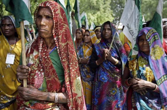 Members of India`s rural communities, including the landless, poor farmers and the tribal community, participate in a protest near the Indian parliament in New Delhi.