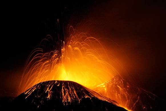 Lava erupts from Mt. Etna`s volcano, near Catania, in Sicily, southern Italy. According to reports it is the tenth eruption of 2013 and it did not pose any threats to the nearby airport and inhabited areas.