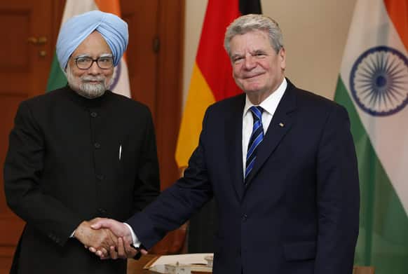 German President Joachim Gauck and the Prime Minister of India, Manmohan Singh, shake hands prior to a meeting at the Bellevue Palace in Berlin.