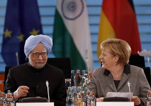German Chancellor Angela Merkel and the Prime Minister of India, Manmohan Singh, chat at the beginning of governmental talks at the chancellery in Berlin, Germany.