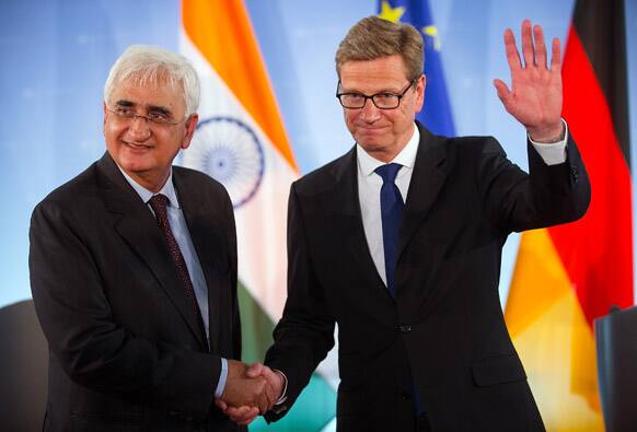 German Foreign Minister Guido Westerwelle and his Indian colleague Salman Khurshid shake hands after a press conference at the Foreign Office in Berlin, Germany.