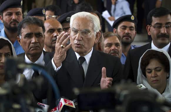Ahmed Raza Kasuri, a defense lawyer for Pakistan`s former military ruler Gen. Pervez Musharraf, speaks to journalists after a hearing in Supreme Court, in Islamabad, Pakistan.