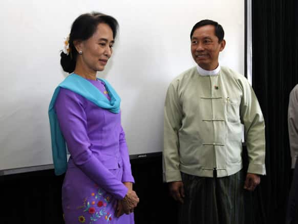 Myanmar Lower House Speaker Thura Shwe Mann and opposition leader Aung San Suu Kyi attend a meeting for the renovation of Yangon General Hospital, which is more than 110 year old, in Yangon, Myanmar.