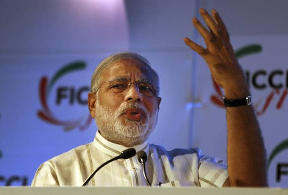 Gujarat state Chief Minister Narendra Modi addresses a gathering of Federation of Indian Chambers of Commerce and Industry Ladies Organization (FLO) during its 29th annual session in New Delhi.