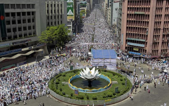 Thousands of Hifazat-e-Islam activists gather for a rally to demand authorities enact an anti-blasphemy law punishing people who insult Islam, in Dhaka.