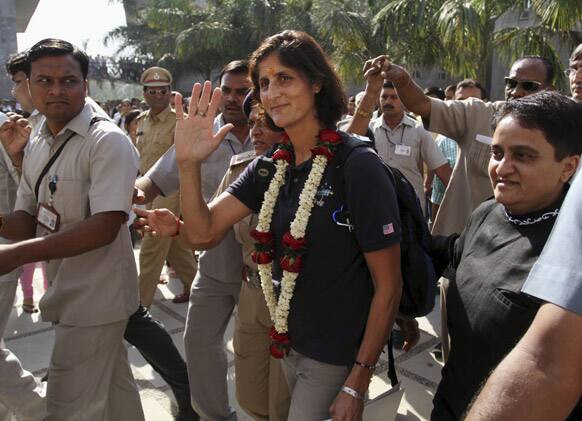 American Astronaut of Indian origin, Sunita Williams waves as she arrives to visit a school near Gandhinagar.