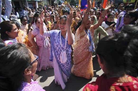 Hindu devotees chant religious slogans during a chariot festival procession of Lord Jagannath in Jammu.