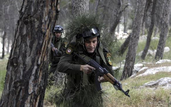 Palestinian security forces participate in an exercise in the West Bank city of Jenin. The force held a regular training to maintain the general readiness for security emergencies.