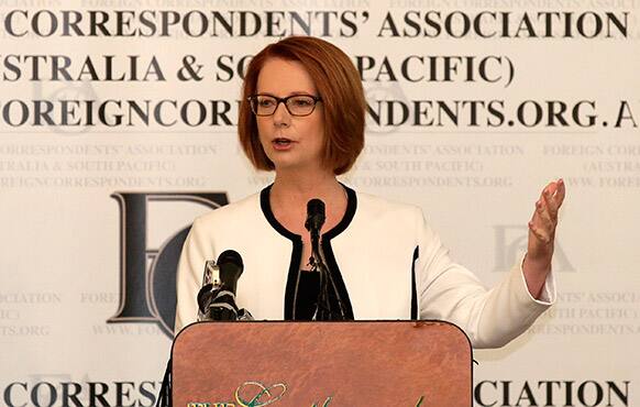 Australia`s Prime Minister Julia Gillard gestures as she speaks to the media during a Q&A session at a Foreign Correspondents` Association luncheon in Sydney.