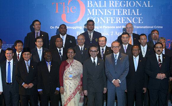 Front row from left, New Zealand`s Immigration Minister Michael Woodhouse, Brunei`s Home Minister Badaruddin Othman, Bangladeshi FM Dipu Moni, Indonesia`s Foreign Minister Marty Natalegawa & Australia`s FM Bob Carr pose for photos at the fifth Bali Process regional ministerial meeting.