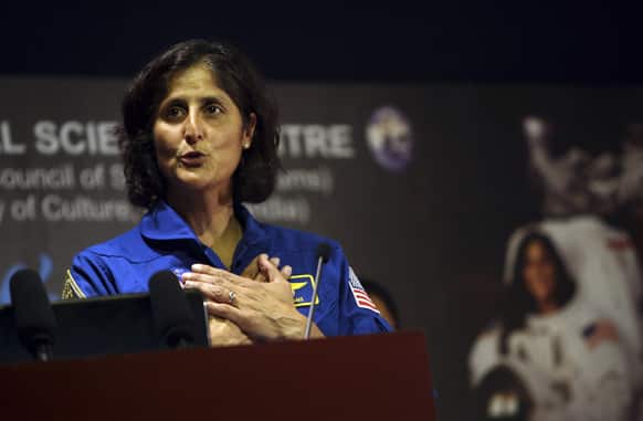American astronaut of Indian origin Sunita Williams gestures during her interaction with Indian students at the National Science Center in New Delhi. Williams, 47, who lived and worked aboard the international space station for six months in 2006, is on a visit to India.