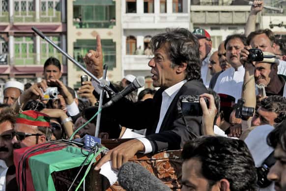 Pakistani cricket legend-turned politician Imran Khan, addresses his supporters during a rally in his support in the northwestern city of Mingora, Pakistan.