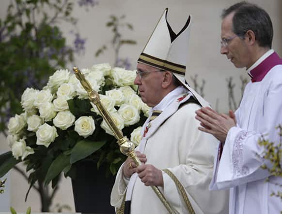 Pope Francis arrives in St. Peter`s square at the Vatican on the occasion of the celebration of the Easter mass.