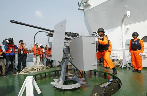 Taiwan Coast Guard demonstrate their forward T-75, 20mm machine gun outside the port in Kaohsiung, Taiwan.
