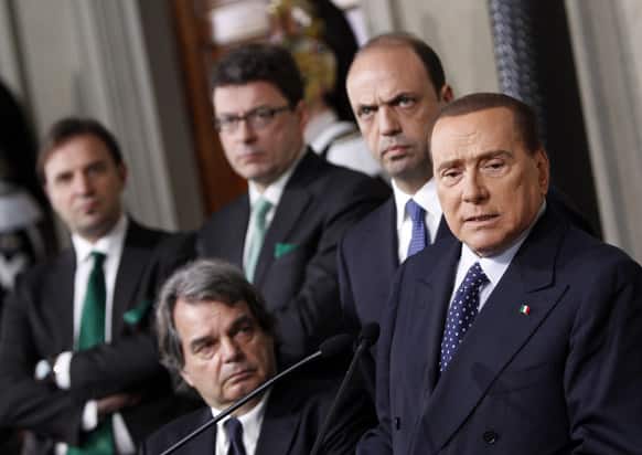 People of Freedom (PdL) center-right party`s leader Silvio Berlusconi, talks to reporters at the end of his talks with Italian President Giorgio Napolitano on the formation of a new government, at the Quirinale presidential palace in Rome.