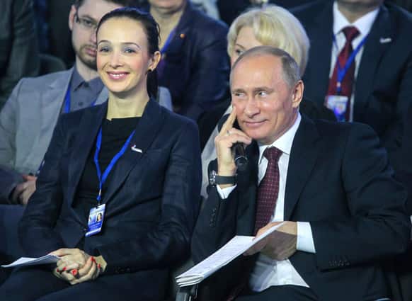 Russian President Vladimir Putin smiles as he attends a conference of the All-Russia Popular Front in Rostov-On-Don, about 960 kilometers (600 miles) south of Moscow.