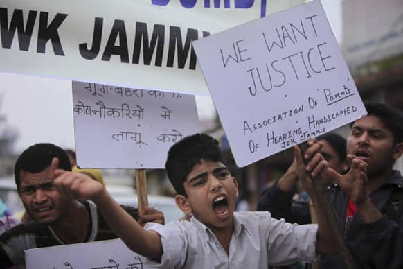 Hearing-impaired children take to a streeet in protest against the Jammu and Kashmir state government in Jammu. The protesters demanded the opening of special schools for them, allotment of slots in government jobs and other demands.