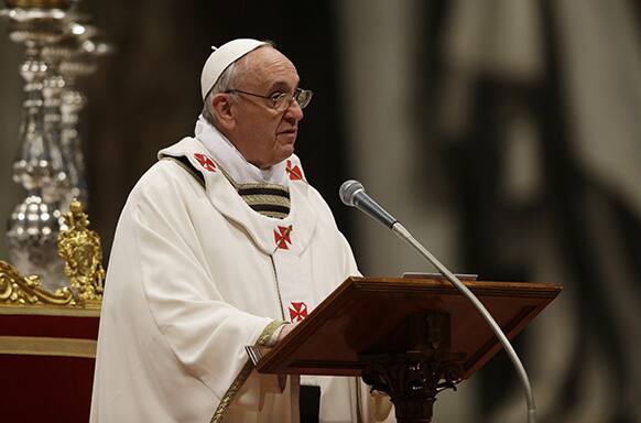 Pope Francis leads the Holy Thursday Mass that marks the start of four days of Easter celebrations, in St. Peter`s Basilica at the Vatican.