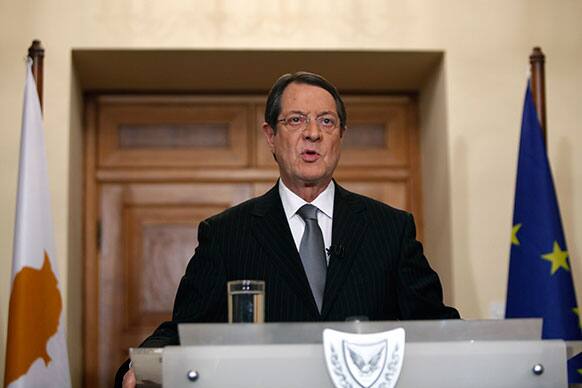Cyprus` President Nicos Anastasiades speaks during a live, televised address to the nation from the Presidential Palace in the capital Nicosia, Cyprus.