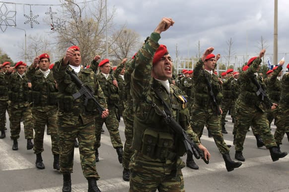 Greek army paratroopers march during a parade to commemorate Independence Day at the northern Greek city of Thessaloniki.