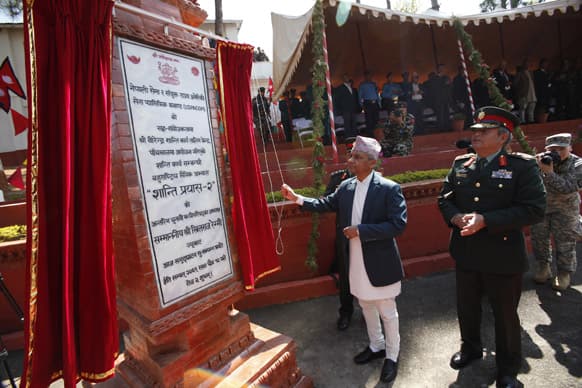 Nepal`s head of interim government Khilraj Regmi inaugurates a training for soldiers from 23 nations in Panchkhal, Kavre Palanchowk district, Nepal.