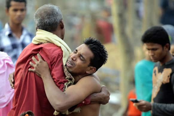 A Bangladeshi man mourns the loss of a relative who fell victim to a tornado, at Banui village, in Brahmanbaria district, Bangladesh. The tornado ripped through 20 villages in eastern Bangladesh, killing almost two dozens of people, with another 200 hurt.