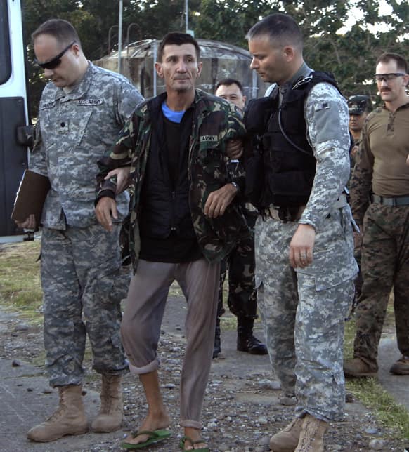 Australian hostage Warren Richard Rodwell, arrives at the Command`s headquarters in Zamboanga city in southern Philippines.