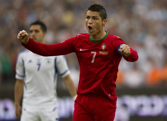 Portugal`s Cristiano Ronaldo celebrates a goal against Israel during 2014 World Cup group F qualifying soccer in the Ramat Gan stadium near Tel Aviv, Israel.