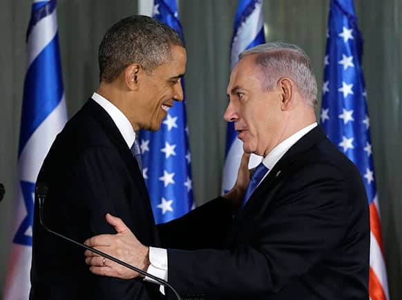 President Barack Obama and Israeli Prime Minister Benjamin Netanyahu shake hands as they participate in a joint news conference, at the prime minister`s residence in Jerusalem.