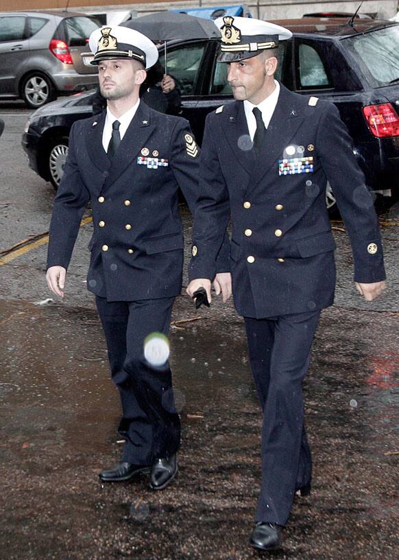 Italian marines Salvatore Girone, left, and Massimiliano Latorre, arrive at a military prosecutor`s office in Rome.