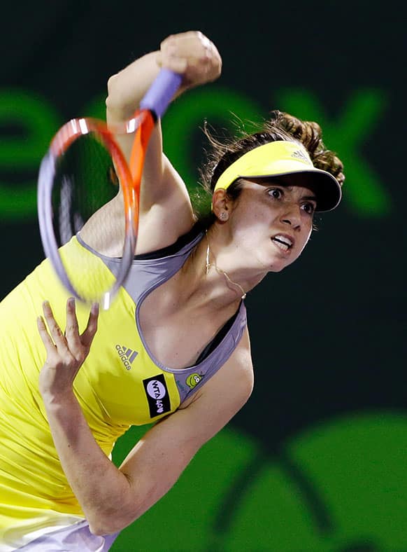 Christina McHale serves to Anett Kontaveit, of Estonia, during the Sony Open tennis tournament.