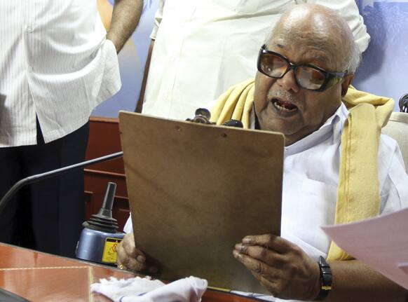Leader of the Dravida Munnetra Kazhagam party M. Karunanidhi speaks at a press conference withdrawing support to India’s ruling United Progressive Alliance government, at the party office in Chennai.