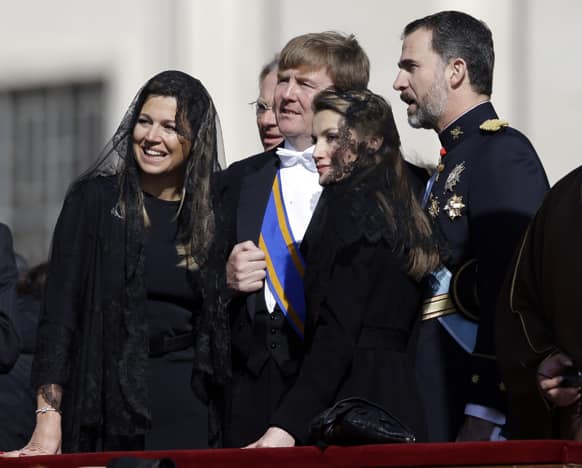 Dutch Prince Alexander, his wife Princess Maxima, Prince Felipe of Spain and his wife Princess Letizia stand in St. Peter`s Square for Pope Francis inaugural Mass, at the Vatican.