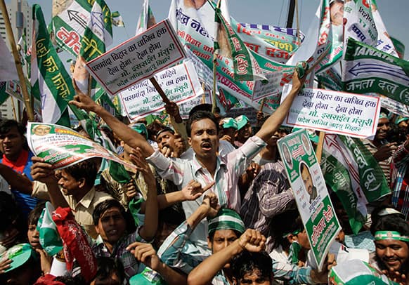 Janata Dal (United) party supporters shout slogans during Adhikar (Rights) rally demanding special status for Bihar state in New Delhi.