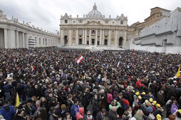 Visitors gather in St. Peter`s Square at the Vatican, before the Angelus prayer by Pope Francis.