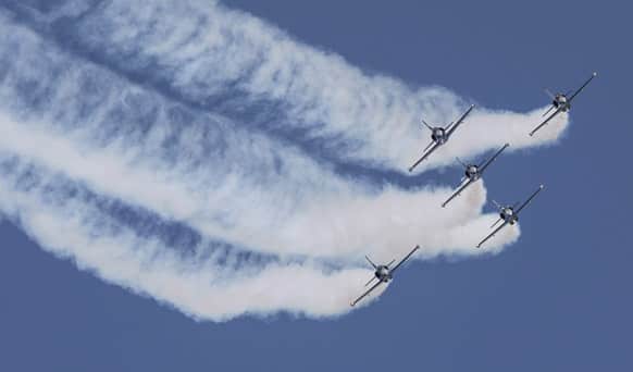 Aero Albatros jets of the Breitling Jet Team perform during an aerobatics display at the Subang Skypark near Kuala Lumpur, Malaysia.