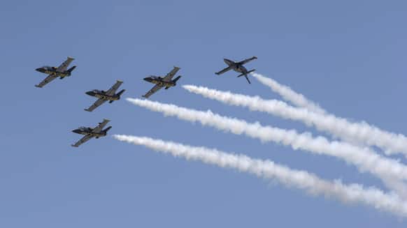 Aero Albatros jets of the Breitling Jet Team perform during an aerobatics display at the Subang Skypark near Kuala Lumpur, Malaysia.