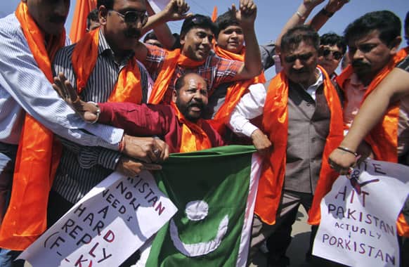 Activists of Shiv Sena party shout anti-Pakistan slogans during a protest in Jammu. The protest was against Pakistan’s Parliament for passing a resolution condemning the hanging of a Mohammed Afzal Guru.